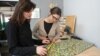 Cristina Tocari (right), founder of "Recycline" workshop in Chisinau