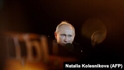 Действующий российский глава Владимир Путин.