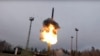 RUSSIA -- An intercontinental ballistic missile Avangard lifts off from a truck-mounted launcher somewhere in Russia, undated