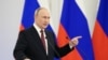 Președintele rus Vladimir Putin anunțând, într-un discurs la Kremlin, anexarea regiunilor ucrainene Donețk, Luhansk, Zaporojie și Herson, Moscova, 30 septembrie 2022.