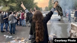 Manifestație în Teheran în sprijinul drepturilor femeilor. 