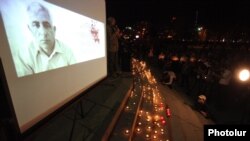 Armenia - A candlelight vigil in Yerevan's Liberty Square in memory of Hrach Muradian, a village mayor murdered on April 2, 4Apr2013.