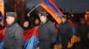 Armenia -- Riot police escort thousands of opposition supporters marching through central Yerevan, 18Feb2011.