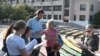 Açıq kök tübünde pyesa: Zaporojyede Sentsovğa qol tutuv tedbirni keçirdiler (video)