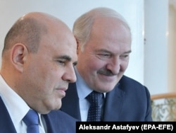 Mihail Misusztyin orosz miniszterelnök és Alekszandr Lukasenka minszki megbeszélésükön, 2021. április 16-án.