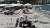 Cu masca de gaze în valiză. Cum se complică vacanța de vară în era schimbărilor climaterice