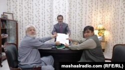 FILE: Lawmaker Mohsin Dawar (R) and Munir Orkazai (L) moved first tabled the bill in March.