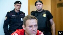 Alexei Navalnîi, opozantul rus, înaintea unui apariții într-un tribunal din Moscova, de pe 22 august 2019