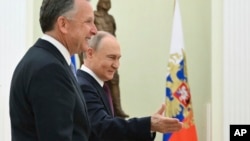 Stiv Uitkoff və Vladimir Putin