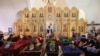 Маленька церква Різдва Пресвятої Богородиці в селі Іванковичі не могла вмістити усіх, хто прийшов віддати останню шану загиблій родині<br>