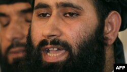 FILE: The Taliban’s office spokesman Muhammad Naeem speaks during a press conference at the opening ceremony of the Taliban political office in Doha,June 2013.