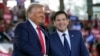 Candidatul la funcția de secretar de stat al SUA, Marco Rubio (dreapta), împreună cu președintele ales al SUA, Donald Trump.