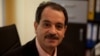 What would the Islamic republic have to fear from the slightly built, mustached 60-year-old, who wears plain Western suits and peppers his speech with mystical poetry, Koranic verses, and scientific references?