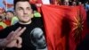 Поддржувач на владејачката ВМРО-ДПМНЕ со маица со ликот на рускиот претседател Владимир Путин на митинг за поддршка на владата во Скопје на 18 мај 2015 година