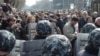 Armenia -- Riot police confront opposition protesters in Yerevan on March 1, 2008.
