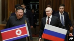 Liderul nord-coreean Kim Jong Un, alături de președintele rus Vladimir Putin. 