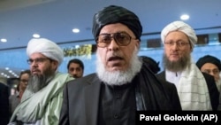 Taliban negotiator Mullah Abbas Stanikzai, center, attends "intra-Afghan" talks in Moscow on February 6.