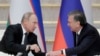 Президент России Владимир Путин (слева) и президент Узбекистана Шавкат Мирзияев. Ташкент, 19 октября 2018 года.